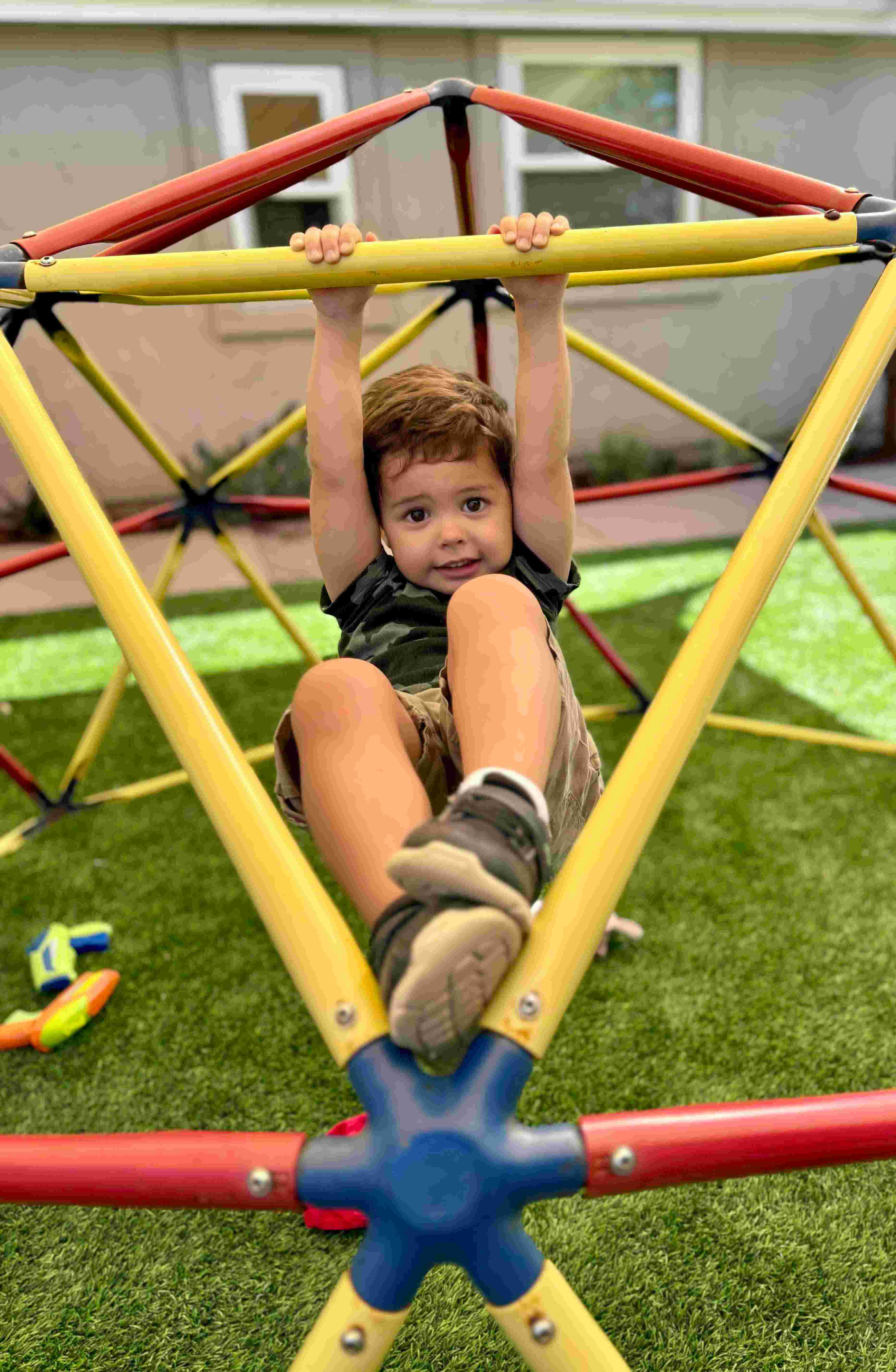 Jungle gym and climbing dome in the backyard at Ms. Rena's Preschool, Escondido
